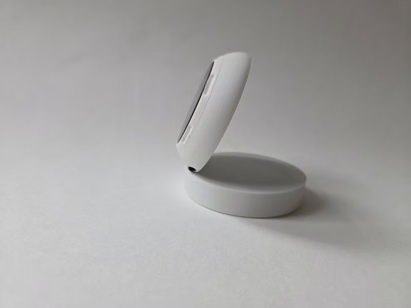 PrintSphere device displaying print progress and temperature metrics