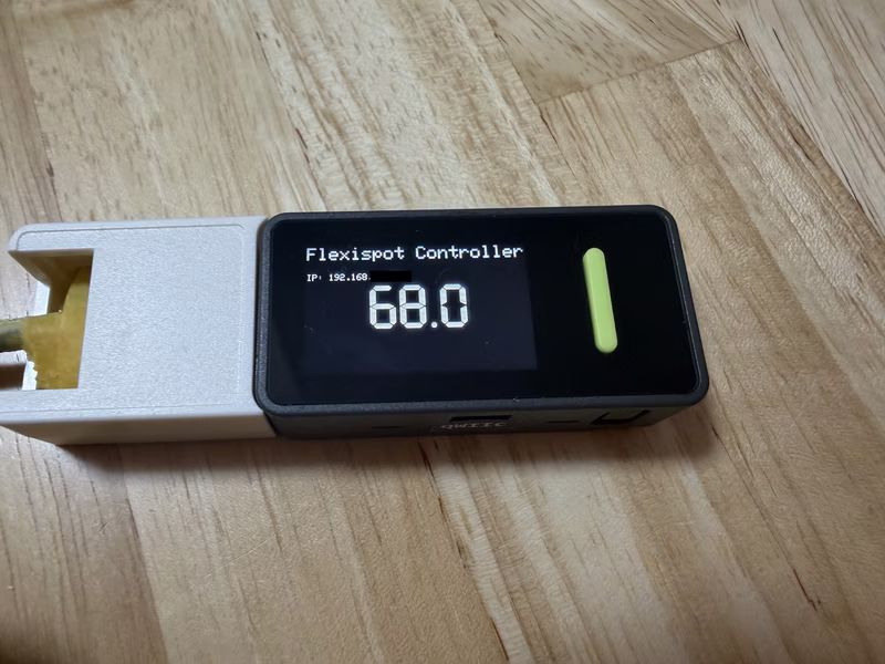 IP address and height displayed on the device screen